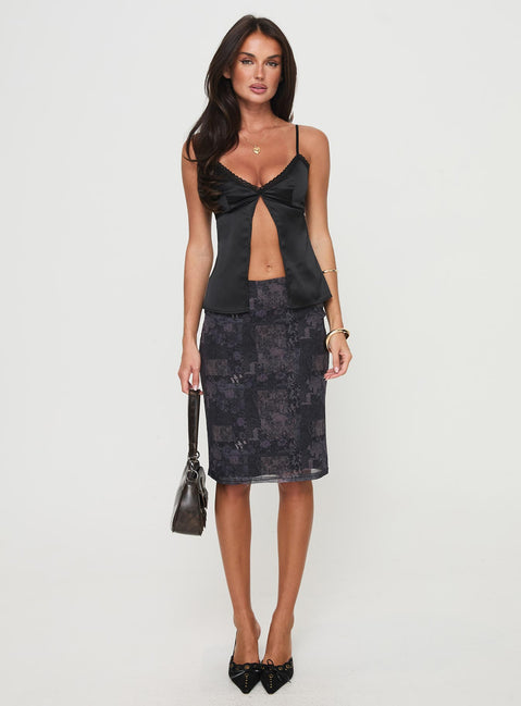 front view of model wearing Princess Polly Gunnar Top Black Sleeveless Plunger 