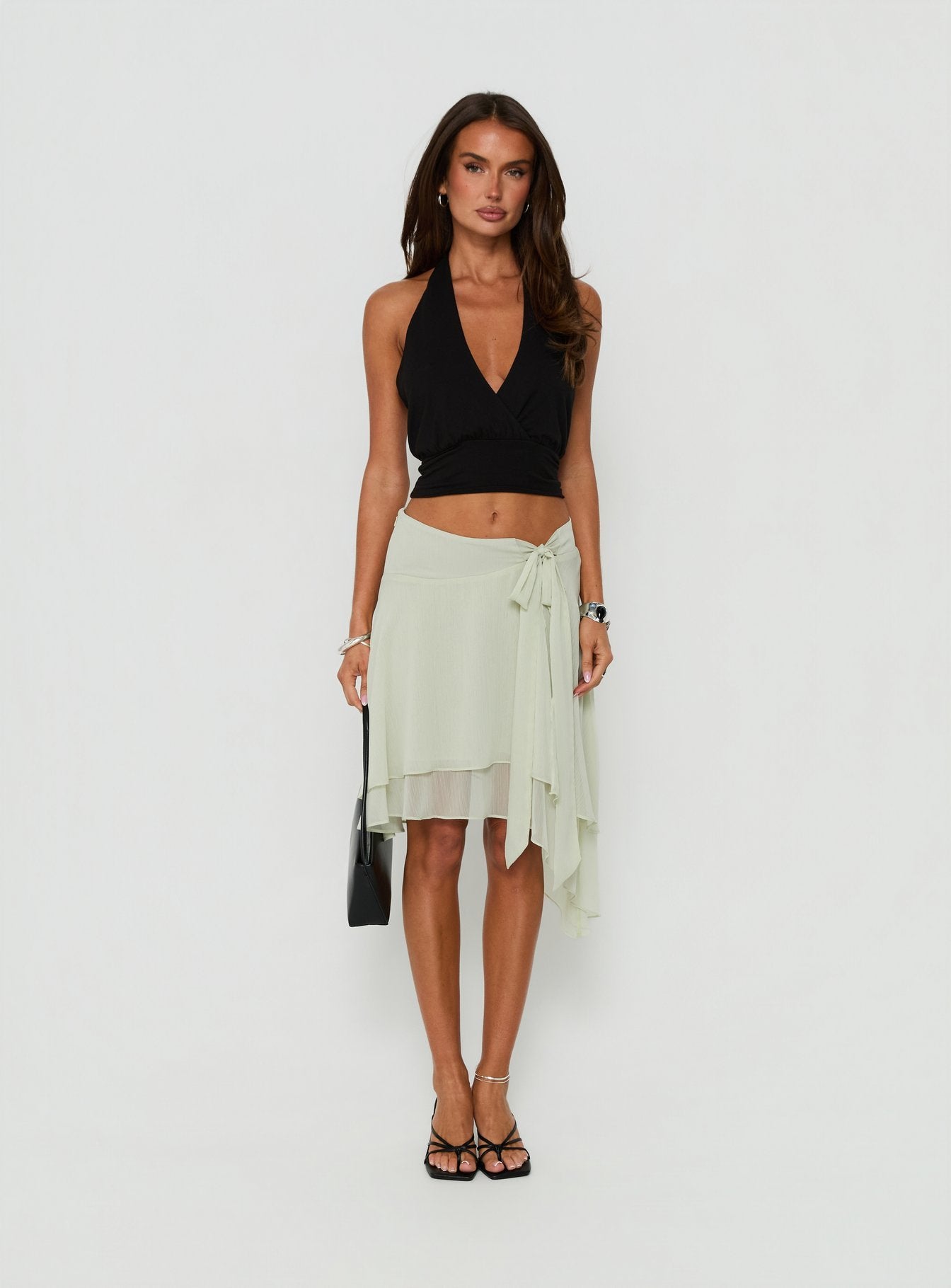 Showcasing the Ophella Tie Waist Chiffon Midi Skirt Sage in womens-skirts front view of model wearing Princess Polly
