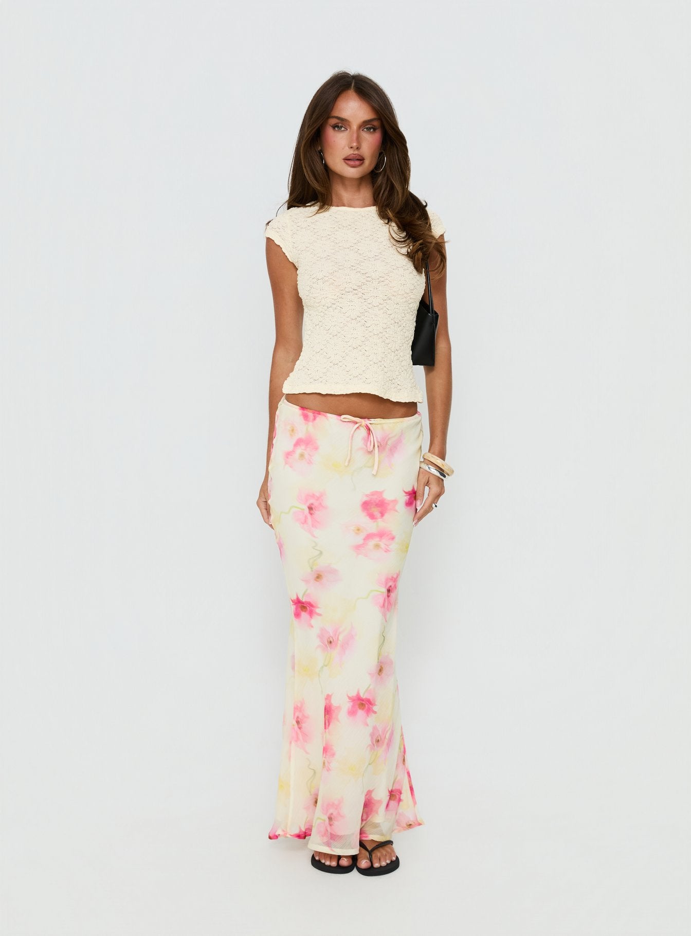   front view of model wearing Princess Polly Mercer Maxi Skirt Yellow Floral Maxi Skirts Skirts 