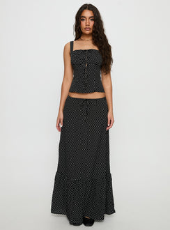   side view of model wearing Princess Polly Modern Girl Maxi Skirt Black / Polka Dot Skirts 