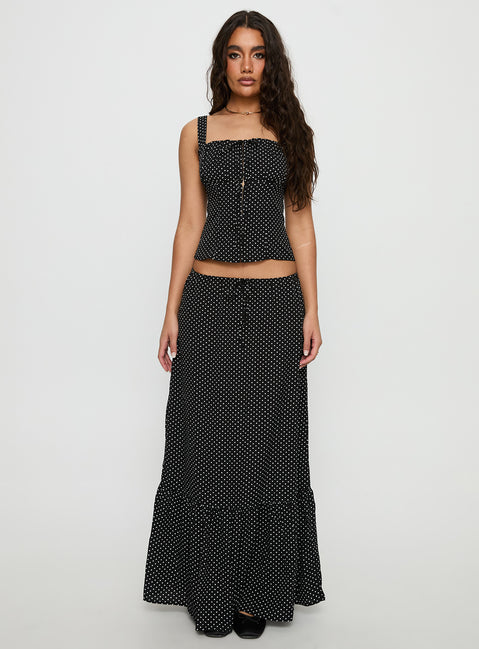   side view of model wearing Princess Polly Modern Girl Maxi Skirt Black / Polka Dot Skirts 