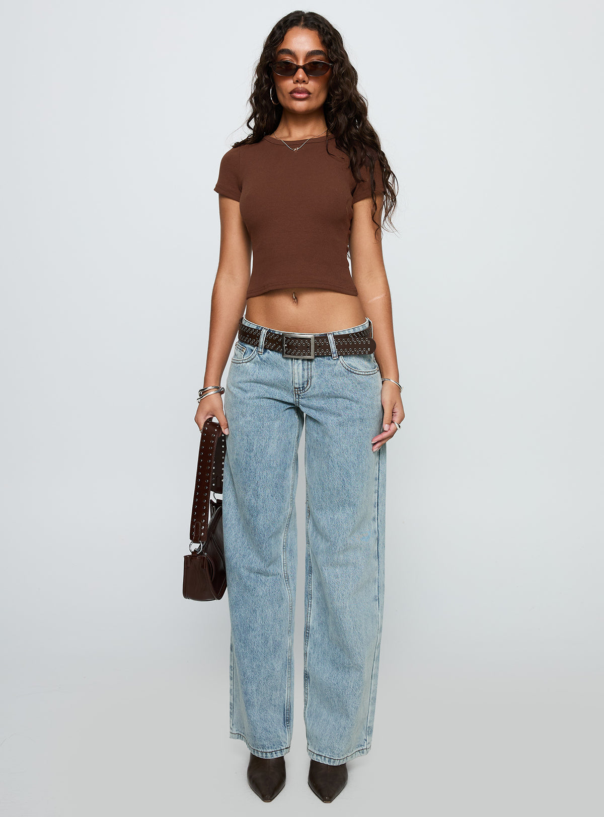 side view of model wearing Princess Polly Baseline Scoop Rib Tee Chocolate Short Sleeves Crew Neck 