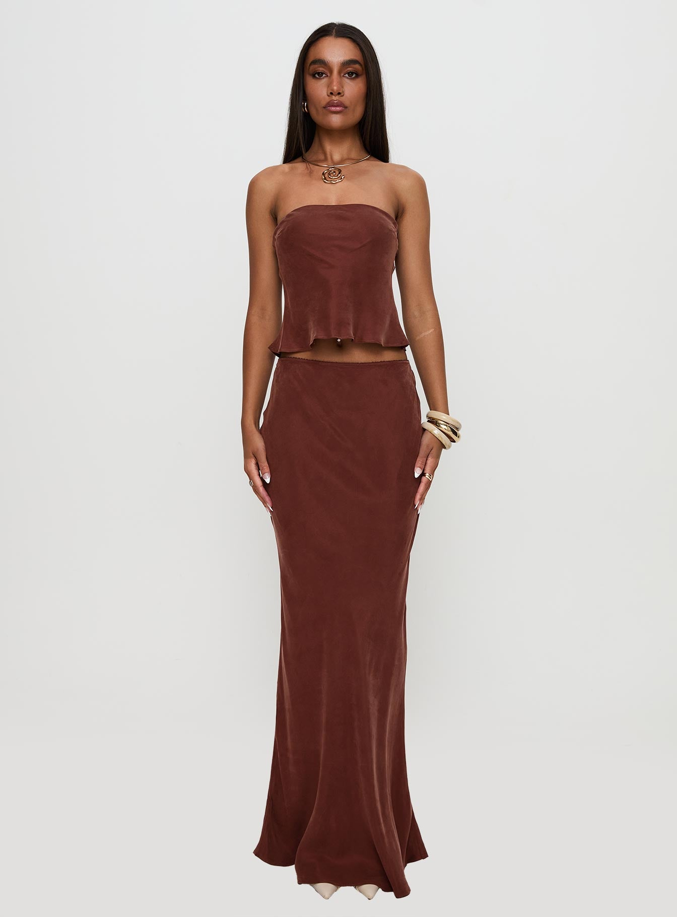 side view of model wearing Princess Polly Lucelia Strapless Top Brown Sleeveless straight 