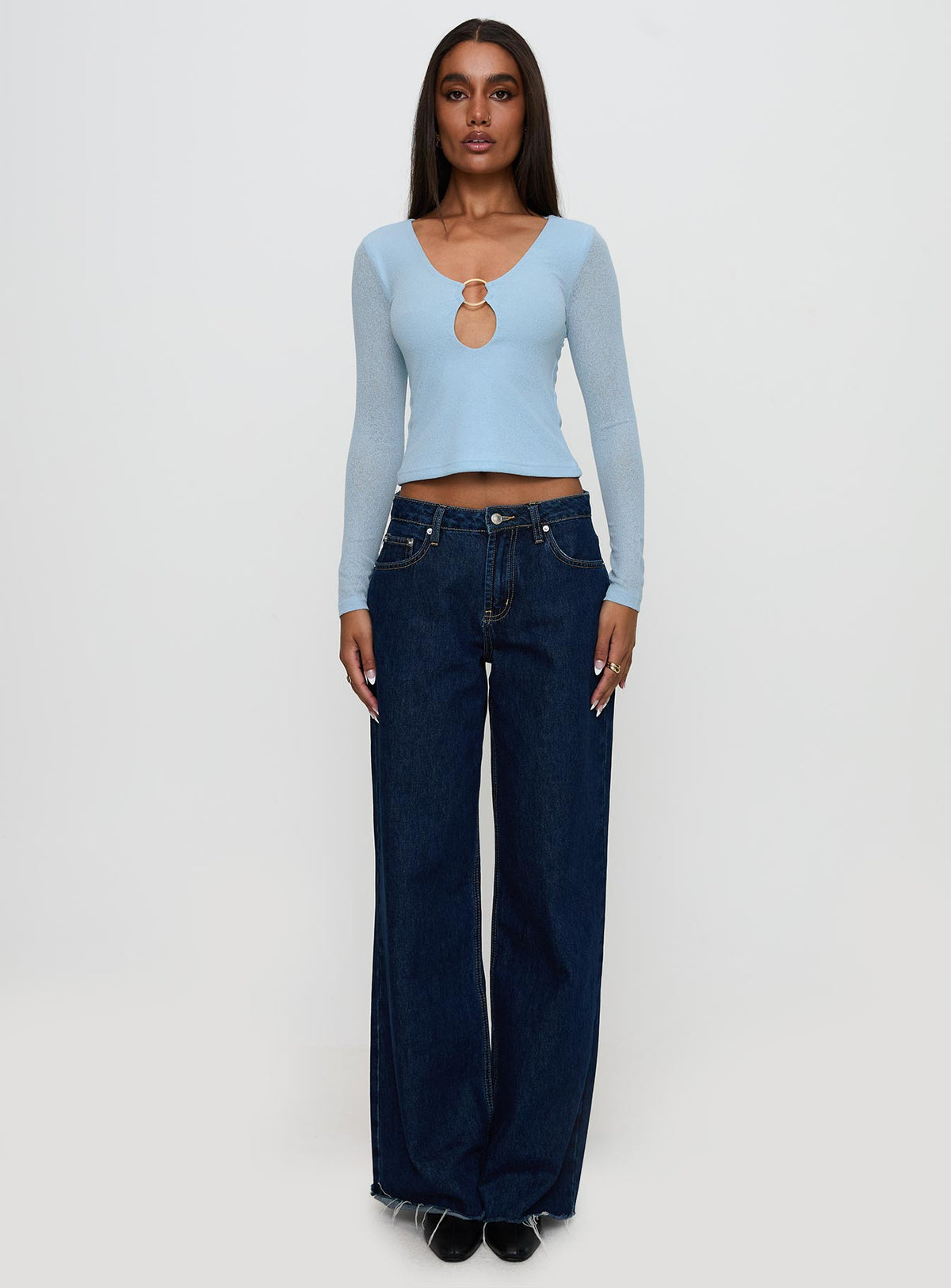 front view of model wearing Princess Polly This Fate Long Sleeve Ring Detail Top Blue Full Sleeves Scoop Neck 