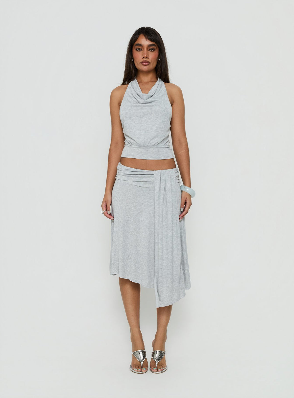 Showcasing the Iselda Draped Midi Skirt Grey Marle in womens-skirts with wrap detail and relaxed fit front view of model wearing Princess Polly