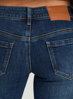 Naketa Ultra Low Rise Bootleg Jeans Mid Blue Wash