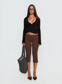 side view of model wearing Princess Polly Baseline Rib Capri Pants Chocolate Mid Rise Pants 