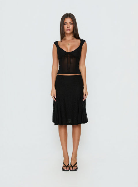 Showcasing the Quani Lace Midi Skirt Black womens-skirts in midi length front view of model wearing Princess Polly