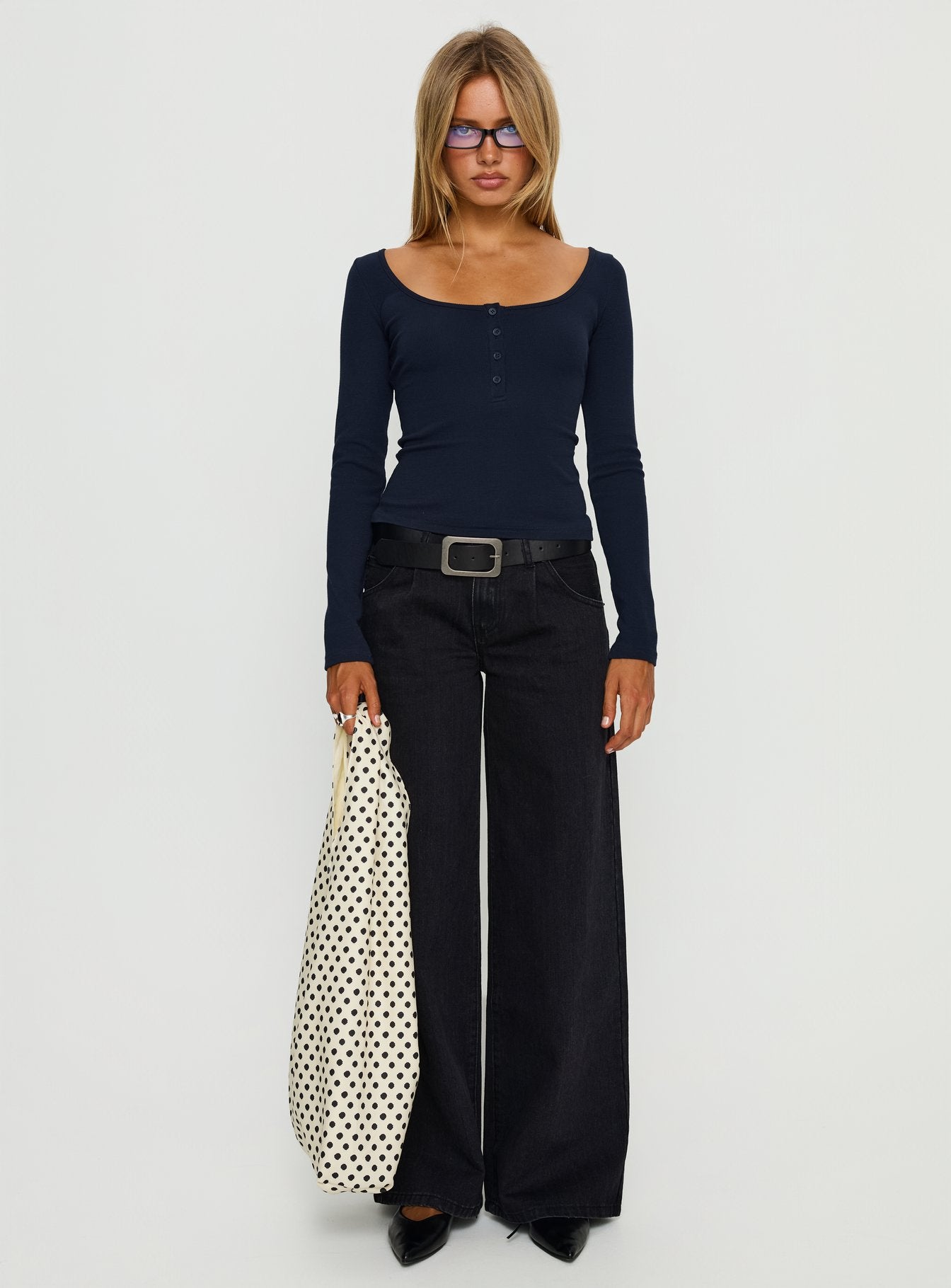 front view of model wearing Princess Polly Supercut Low Rise Baggy Pleat Jeans Washed Black Low Rise Jeans 