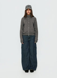 Showcasing the Nikoletta Mid Rise Wide Leg Cargo Jeans Dark Blue Wash in womens-jeans with mid-rise front view of model wearing
