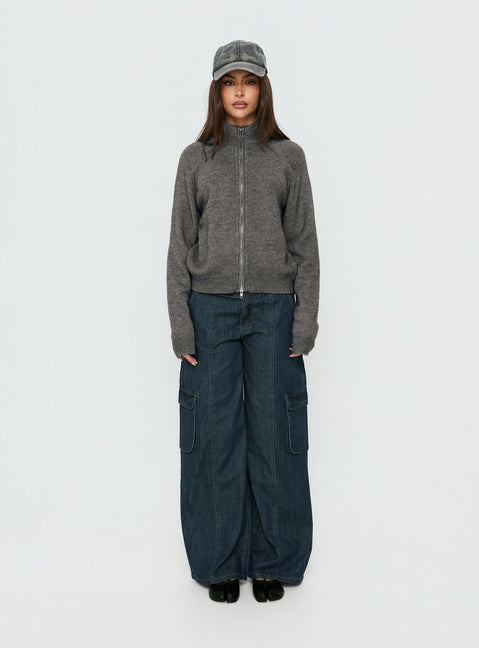 Showcasing the Nikoletta Mid Rise Wide Leg Cargo Jeans Dark Blue Wash in womens-jeans with mid-rise front view of model wearing