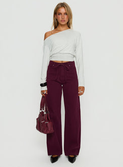 side view of model wearing Princess Polly Bruiser Tie Waist Mid Rise Wide Leg Jeans Currant High Rise Jeans 
