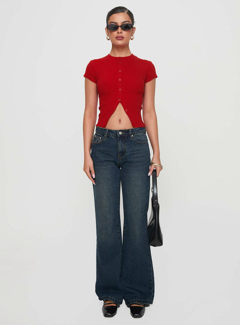 front view of model wearing Princess Polly Suzu Top Red Short Sleeves High Neck 