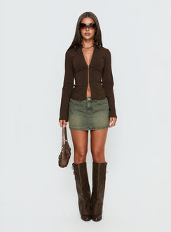   side view of model wearing Princess Polly Laynee Butterfly Mini Skirt Washed Green Mini Skirts 