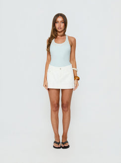   front view of model wearing Princess Polly Warna Low Rise Denim Mini Skirt White Mini Skirts 