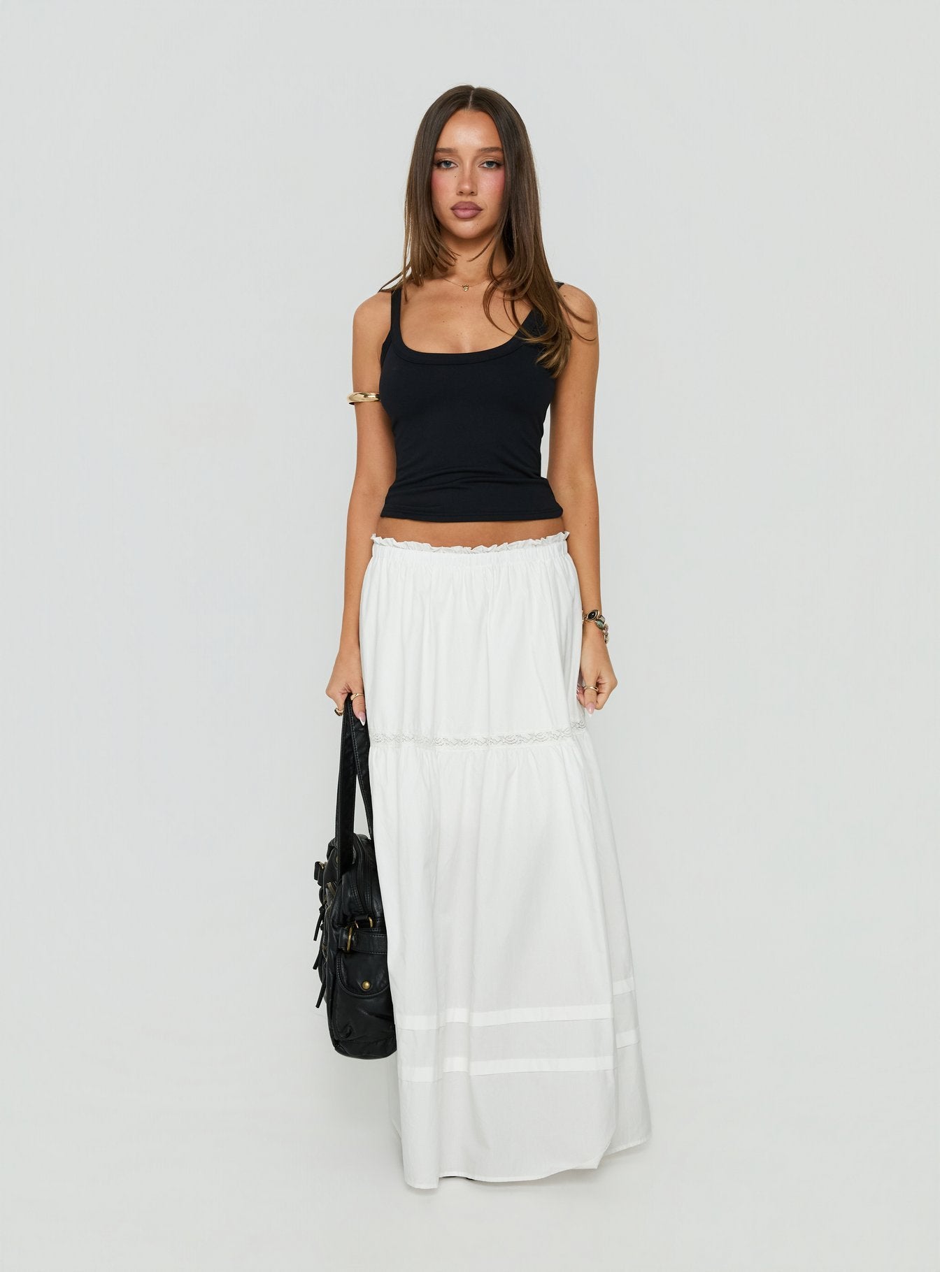 Showcasing the Meanna Tiered Maxi Skirt White in womens-skirts with maxi length front view of model wearing Princess Polly