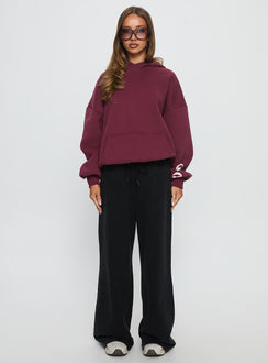 front view of model wearing Princess Polly Kisses Graphic Hoodie Wine Longline Jumpers Jumpers 