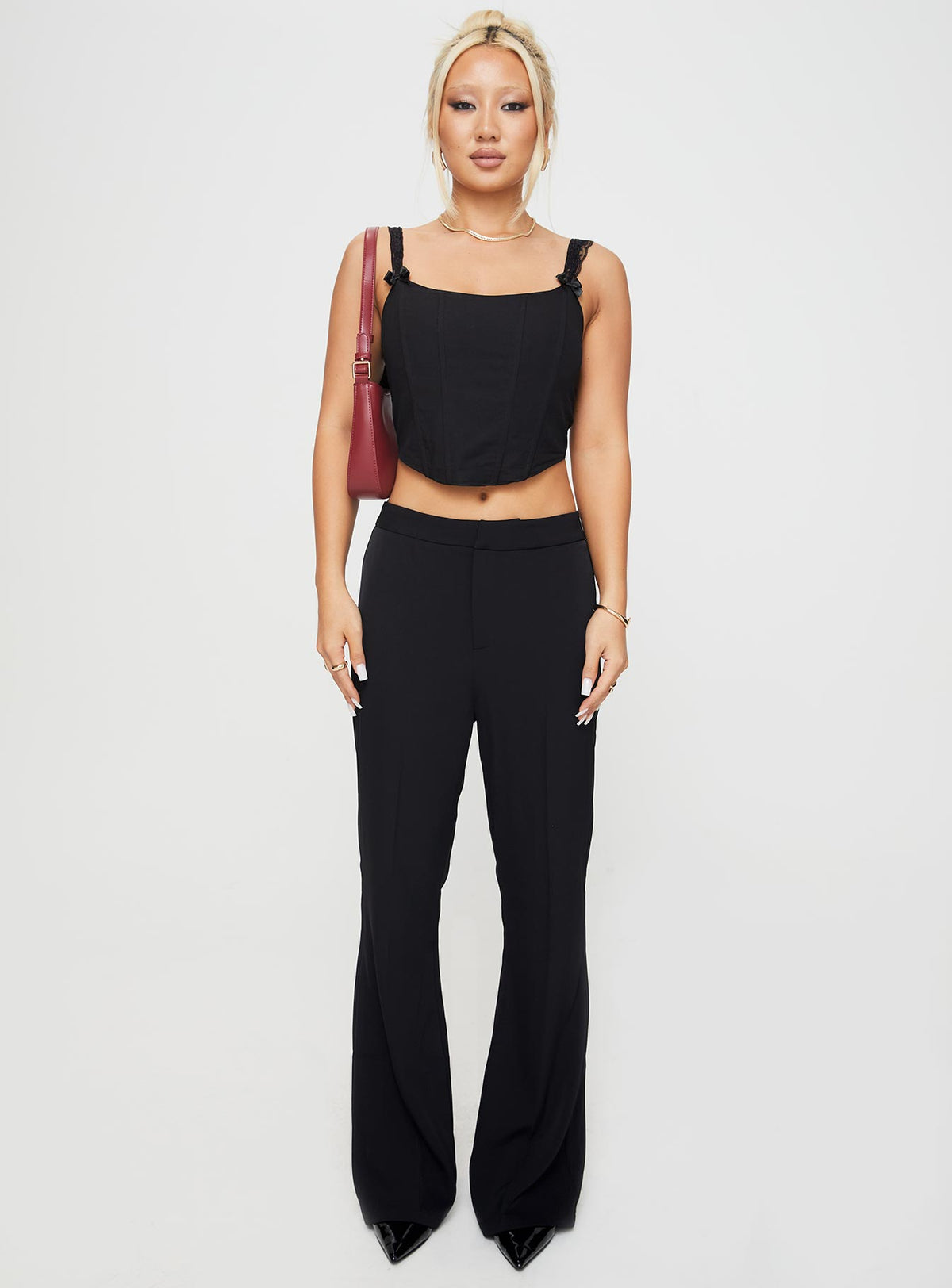 front view of model wearing Princess Polly Thaxten Top Black Sleeveless Square Neck 