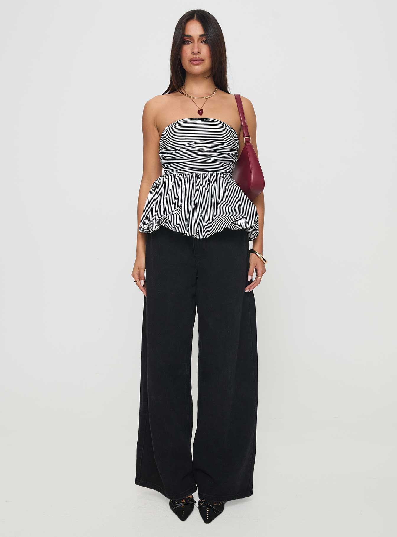 front view of model wearing Princess Polly Selenea Bubble Hem Top Black / White Sleeveless straight 