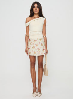   front view of model wearing Princess Polly Sonnet Mini Skirt Cream / Multi Floral Mini Skirts 