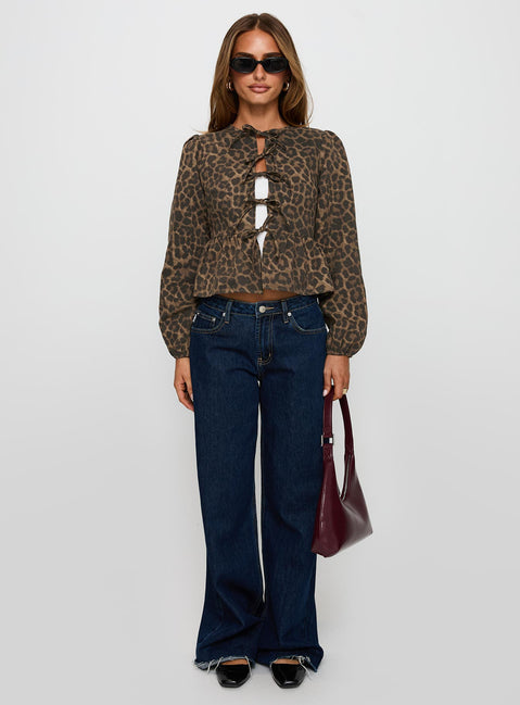 side view of model wearing Princess Polly Recognize Tie Detail Long Sleeve Top Leopard Full Sleeves Crew Neck 