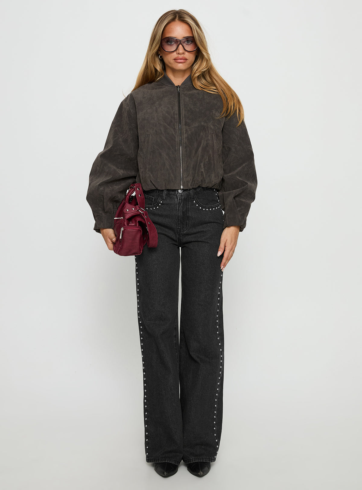 front view of model wearing Princess Polly Saving Up Stud Detail Jeans Jet Black High Rise Jeans 