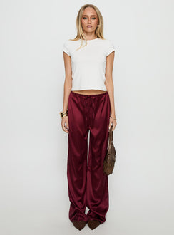 front view of model wearing Princess Polly Soulstar Satin Pants Wine Mid Rise Pants 