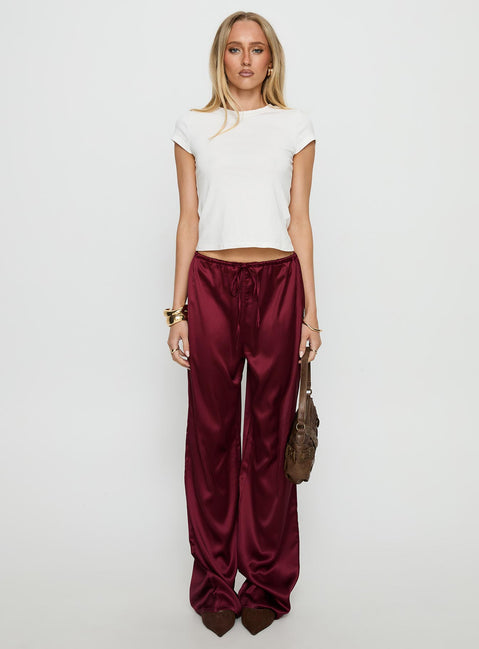 front view of model wearing Princess Polly Soulstar Satin Pants Wine Mid Rise Pants 