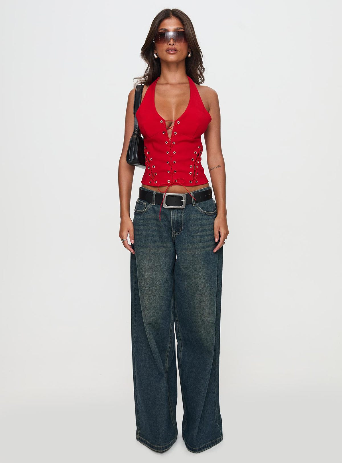 front view of model wearing Princess Polly Come See Me Tie Up Halter Top Red Sleeveless Plunger 
