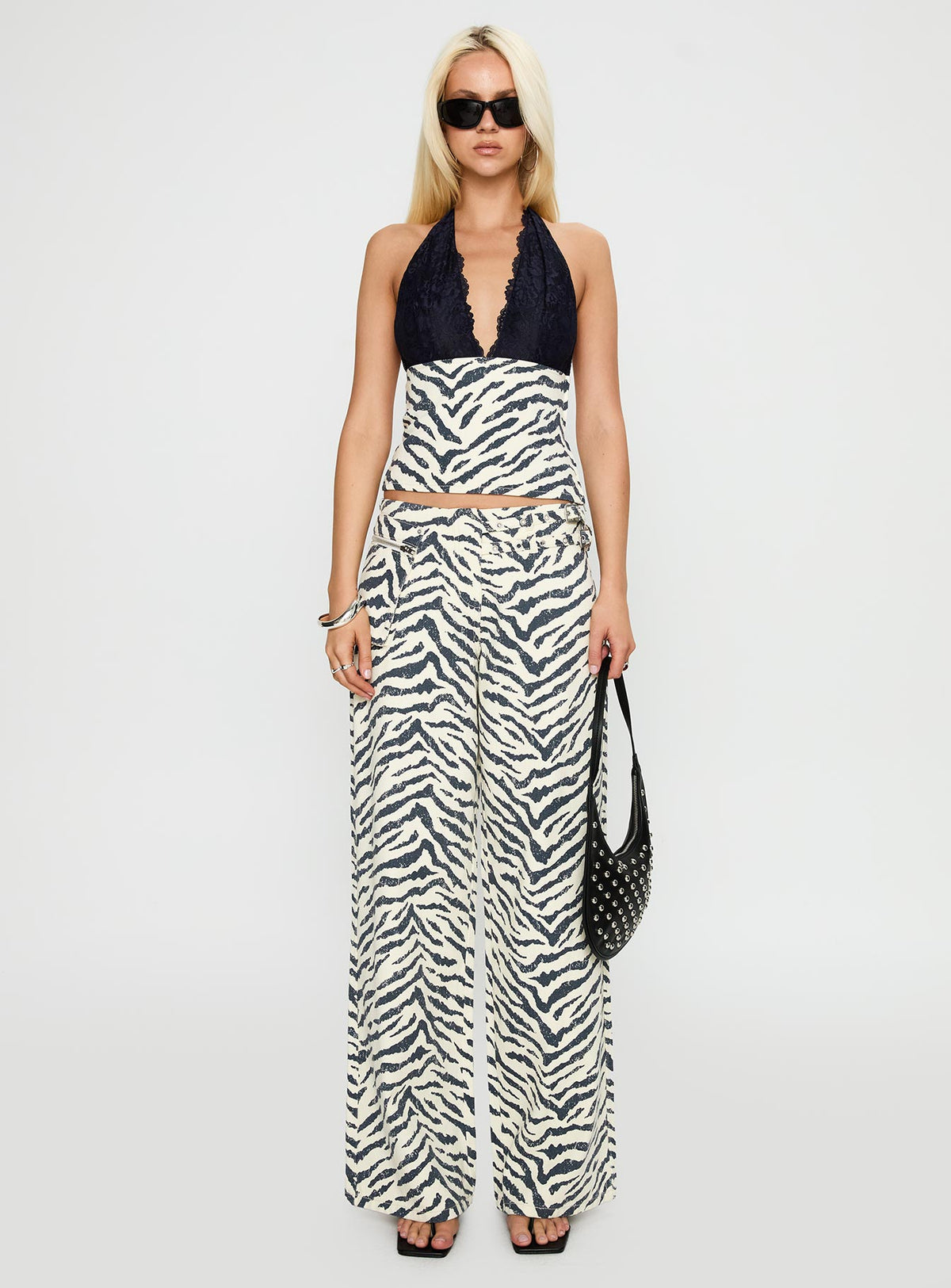 front view of model wearing Princess Polly Guilty Pleasure Top Zebra Sleeveless Plunger 