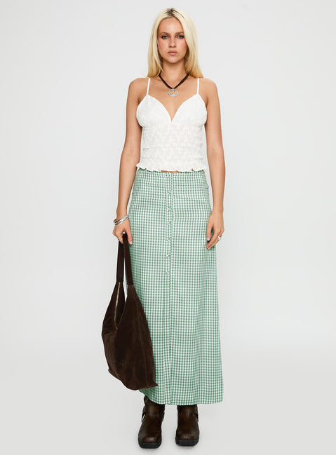 side view of model wearing Princess Polly Clued In Frill Detail Top White Sleeveless Plunger 
