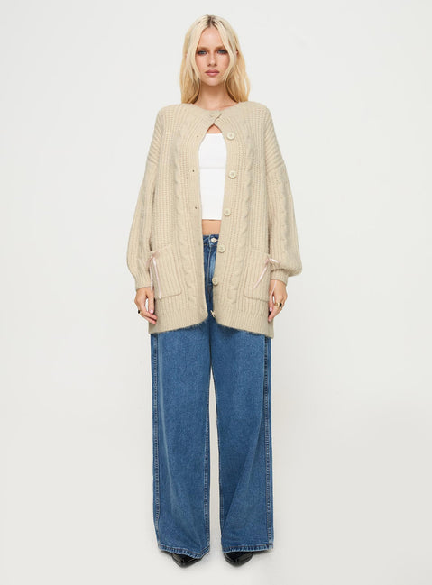 side view of model wearing Princess Polly Cameliah Knit Cardigan Cream Long 
