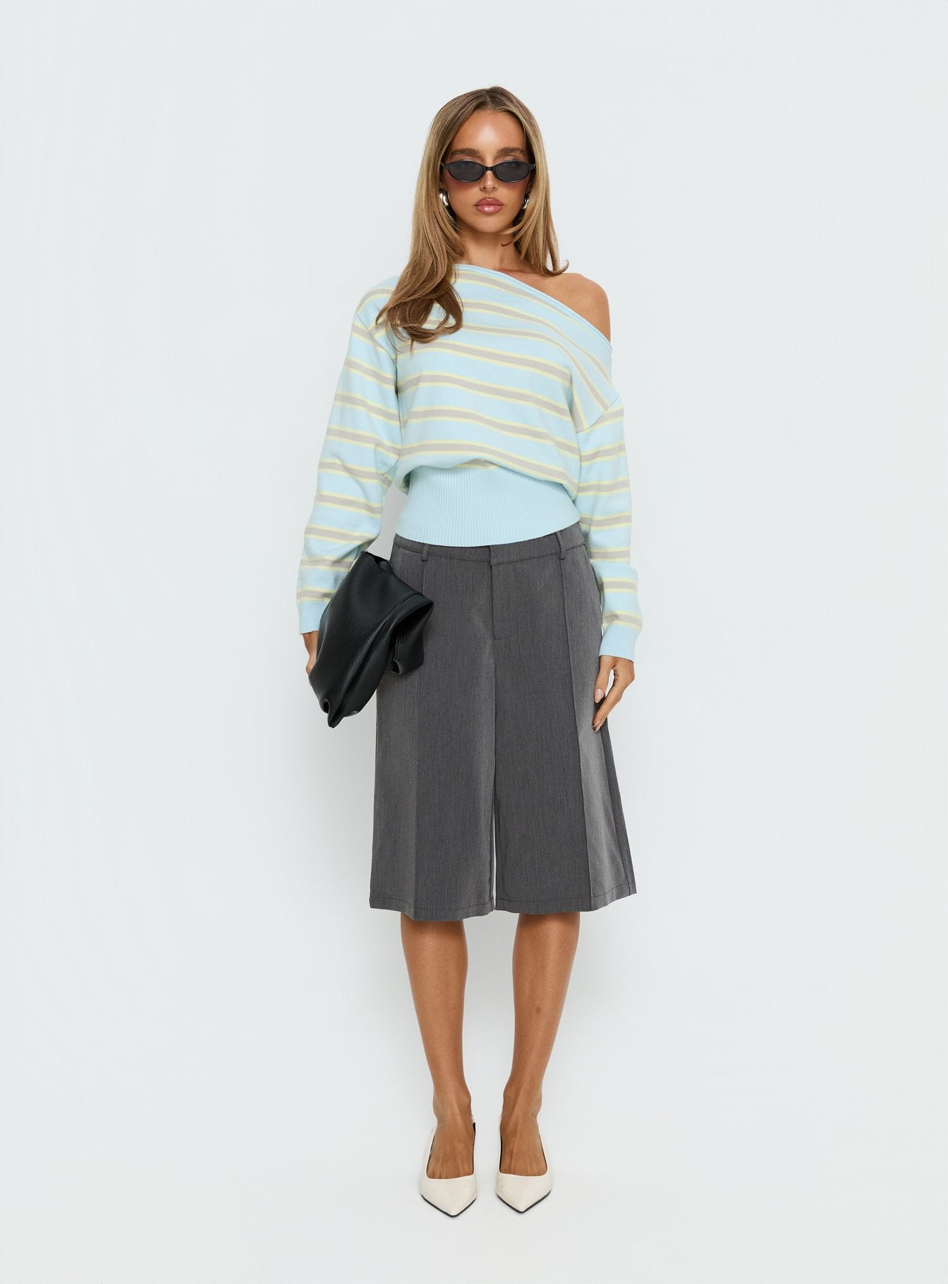 side view of model wearing Princess Polly Zinia Off Shoulder Knit Sweater Grey / Blue Stripe Cropped Jumpers 