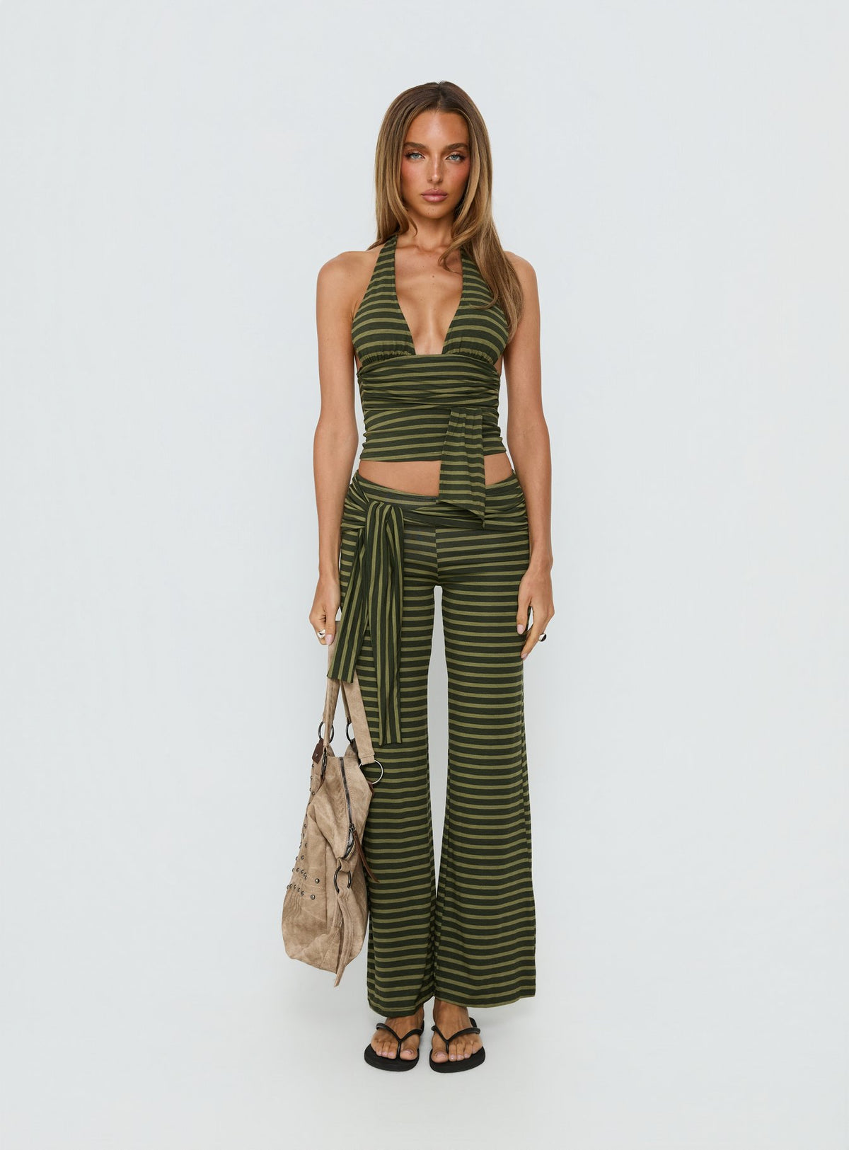 front view of model wearing Princess Polly Esata Tie Detail Pants Green Stripe Mid Rise Pants 
