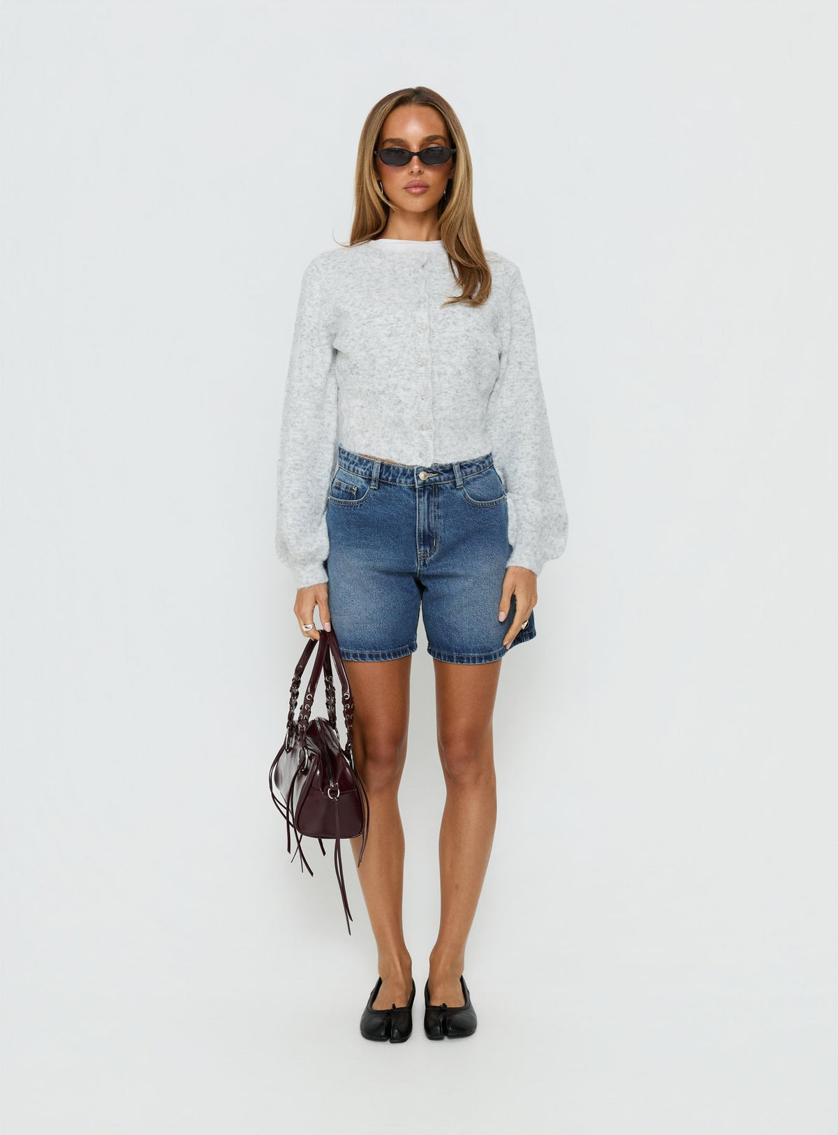side view of model wearing Princess Polly Dawsen Button Down Cardigan Grey cropped 
