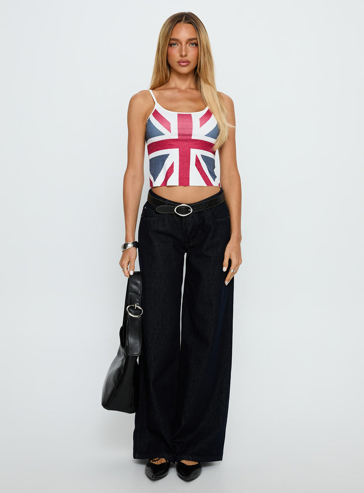 front view of model wearing Princess Polly Ramos Low Rise Wide Leg Jeans Raw Indigo Blue Low Rise Jeans 