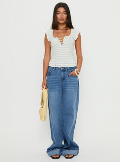front view of model wearing Princess Polly Jacobie Mid Rise Wide Leg Jeans Mid Blue Wash Mid Rise Jeans 