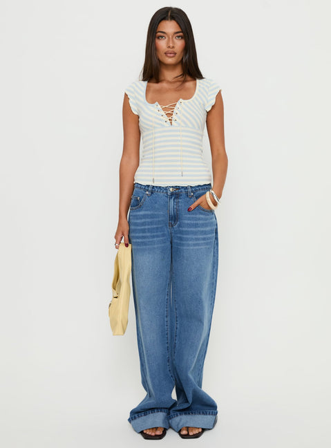 front view of model wearing Princess Polly Jacobie Mid Rise Wide Leg Jeans Mid Blue Wash Mid Rise Jeans 