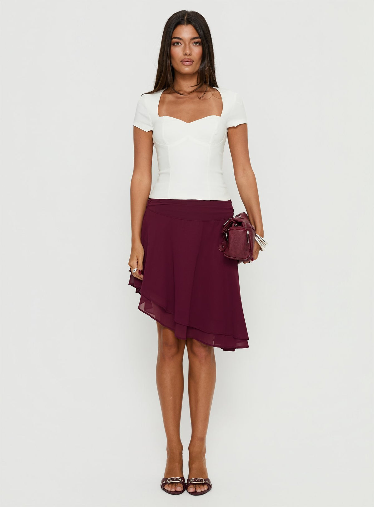   front view of model wearing Princess Polly Evanescence Asymmetrical Midi Skirt Cherry 