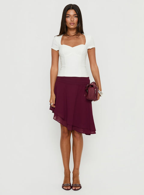   front view of model wearing Princess Polly Evanescence Asymmetrical Midi Skirt Cherry 