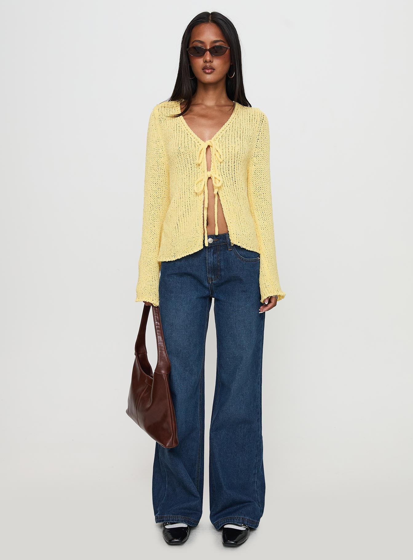 side view of model wearing Princess Polly Swain Knit Cardigan Lemon 
