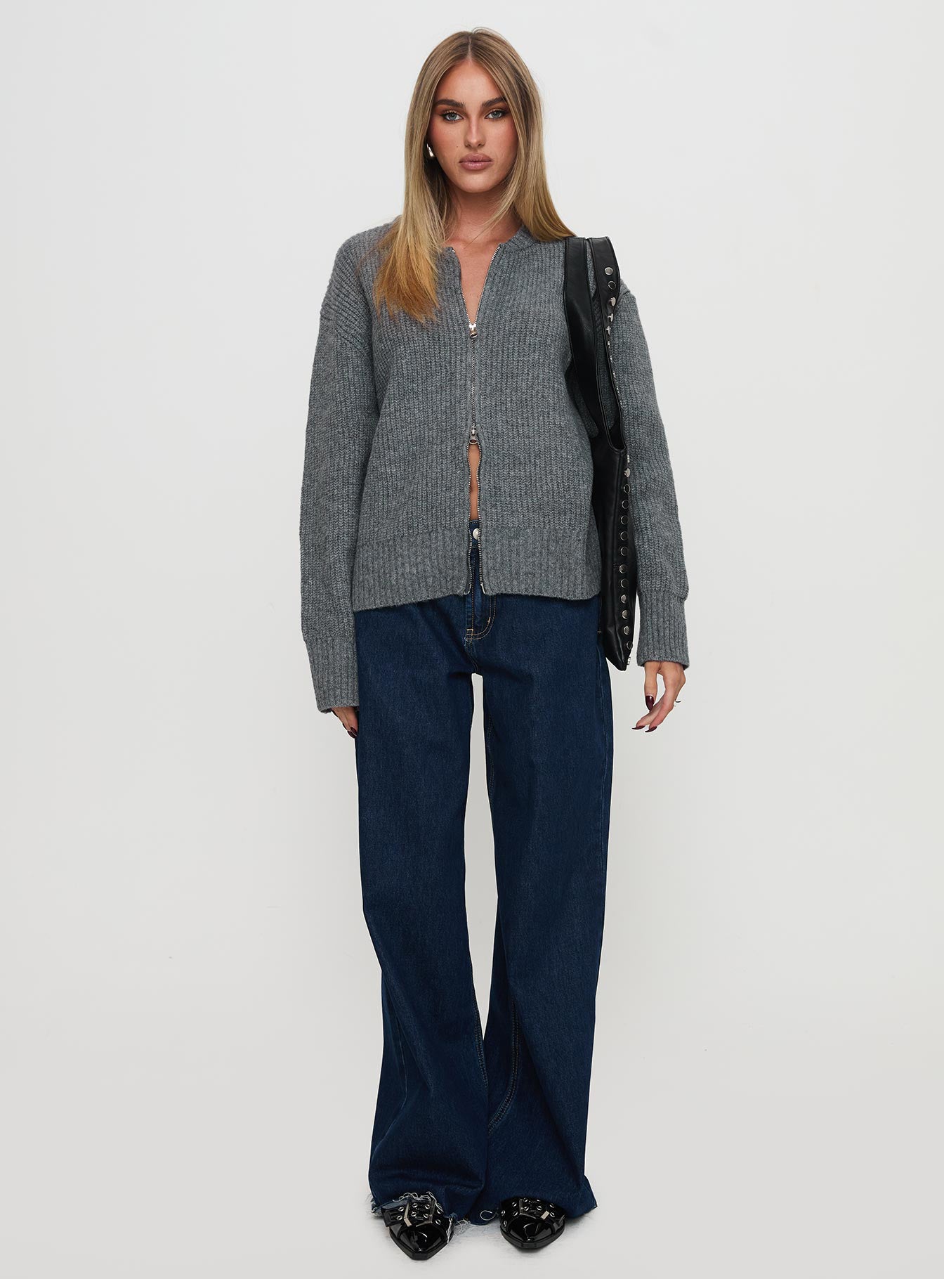side view of model wearing Princess Polly Lexene Zip Through Jumper Grey Long 
