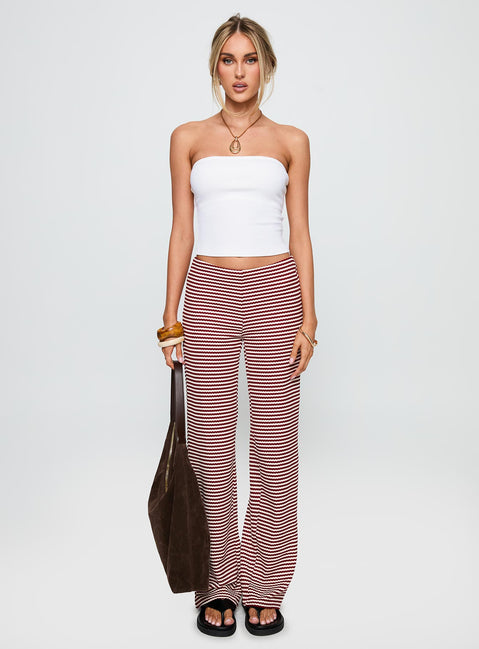 side view of model wearing Princess Polly Next To Me Lounge Pant Red / White Stripe Low Rise Pants 