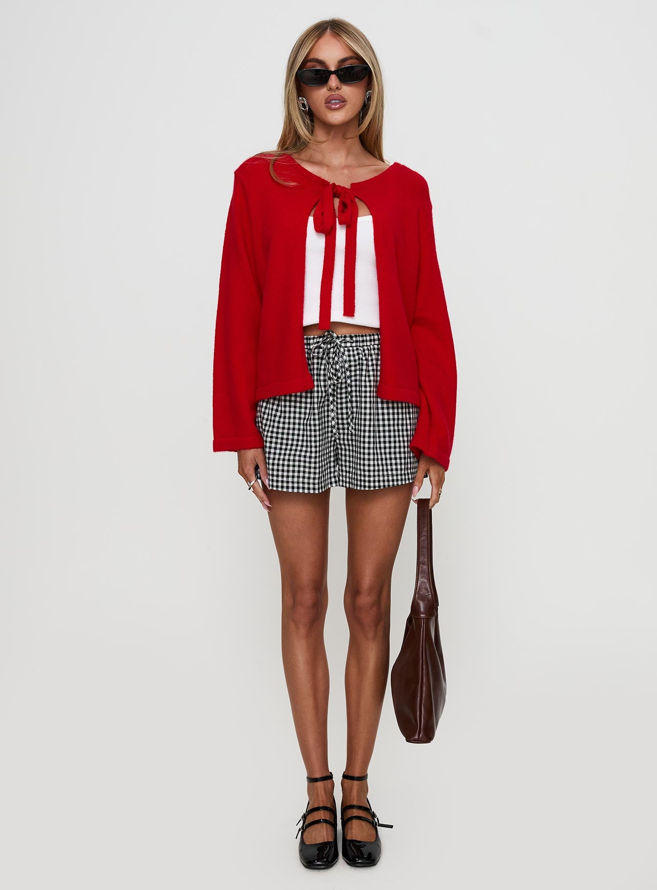 front view of model wearing Princess Polly Norine Tie Up Knit Sweater Red Cropped 