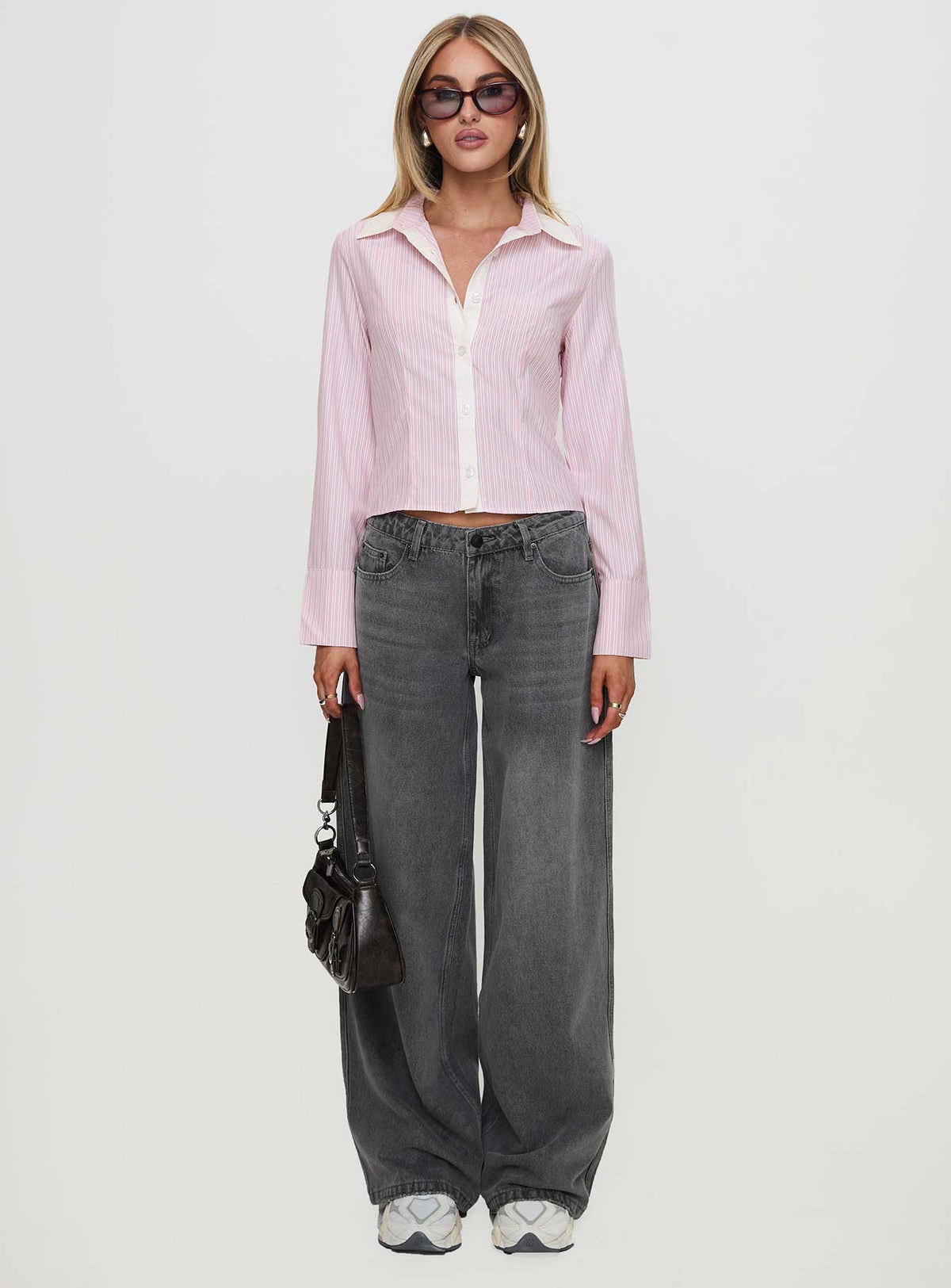 front view of model wearing Princess Polly Ramos Low Rise Denim Jeans Grey Wash Mid Rise 