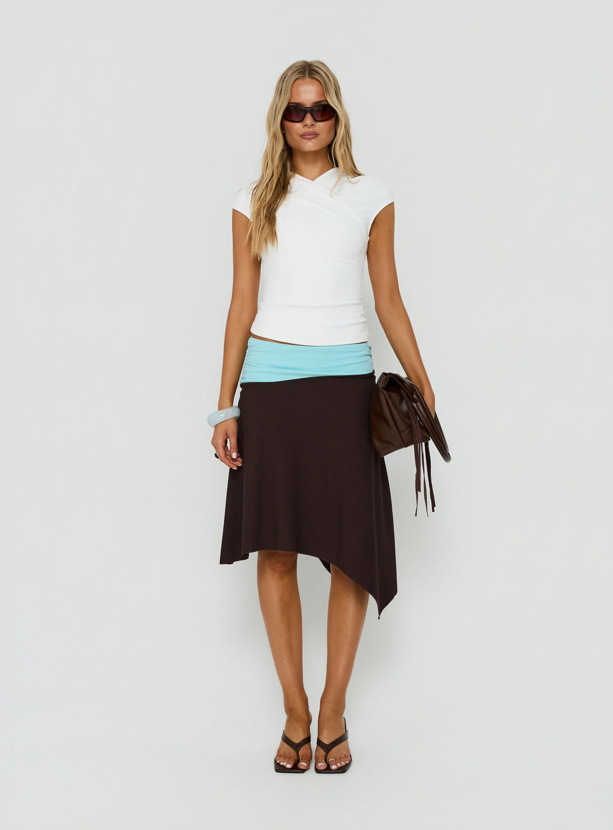 Featuring the Suave Asymmetrical Contrast Midi Skirt Brown / Aqua womens-skirts in midi length view of model wearing Princess Polly
