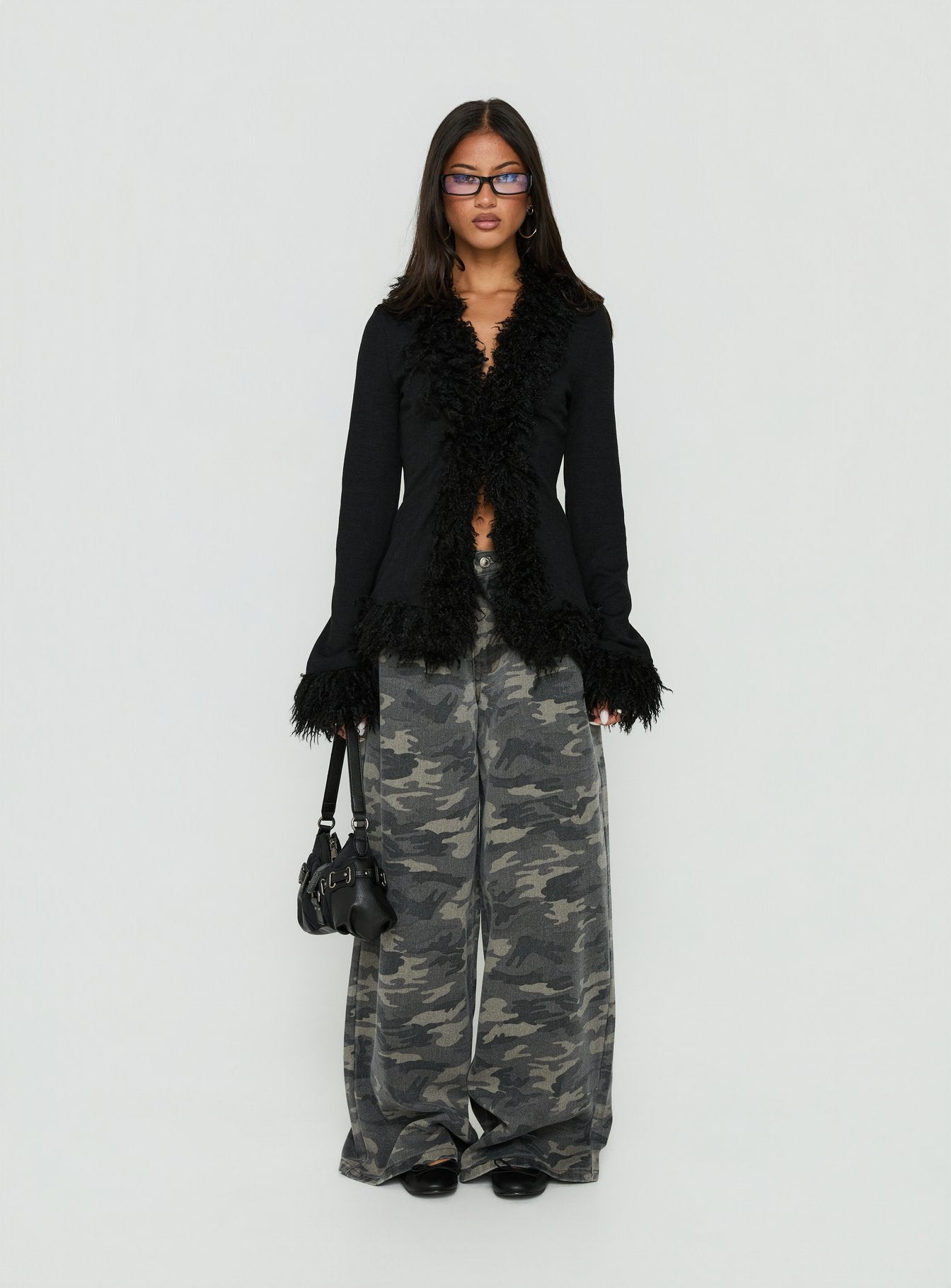 Discover the Brynlie Faux Fur Trim Boxy Cardigan in Black womens-jumpers with short length front view of model wearing Princess Polly