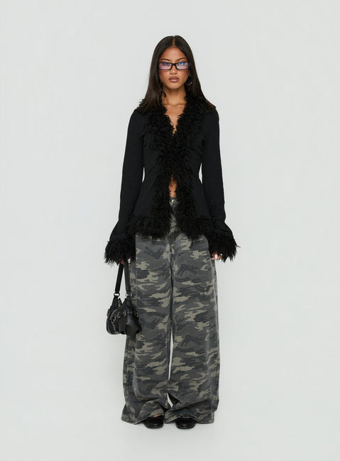 Discover the Brynlie Faux Fur Trim Boxy Cardigan in Black womens-jumpers with short length front view of model wearing Princess Polly