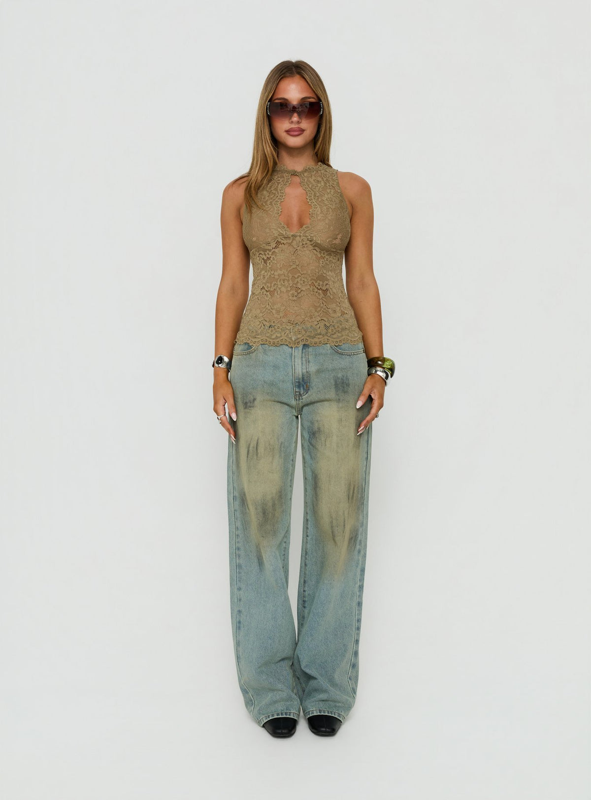 Showcasing the Top Model Jean Stone Blue womens-jeans in high-rise fit front view of model wearing Princess Polly