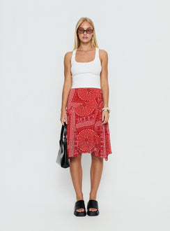   front view of model wearing Princess Polly Raenah Asymmetrical Midi Skirt Red Paisley 
